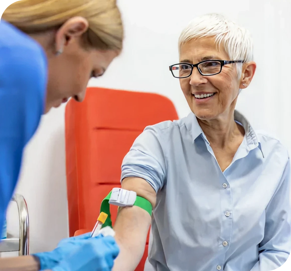 Medical professional taking blood sample