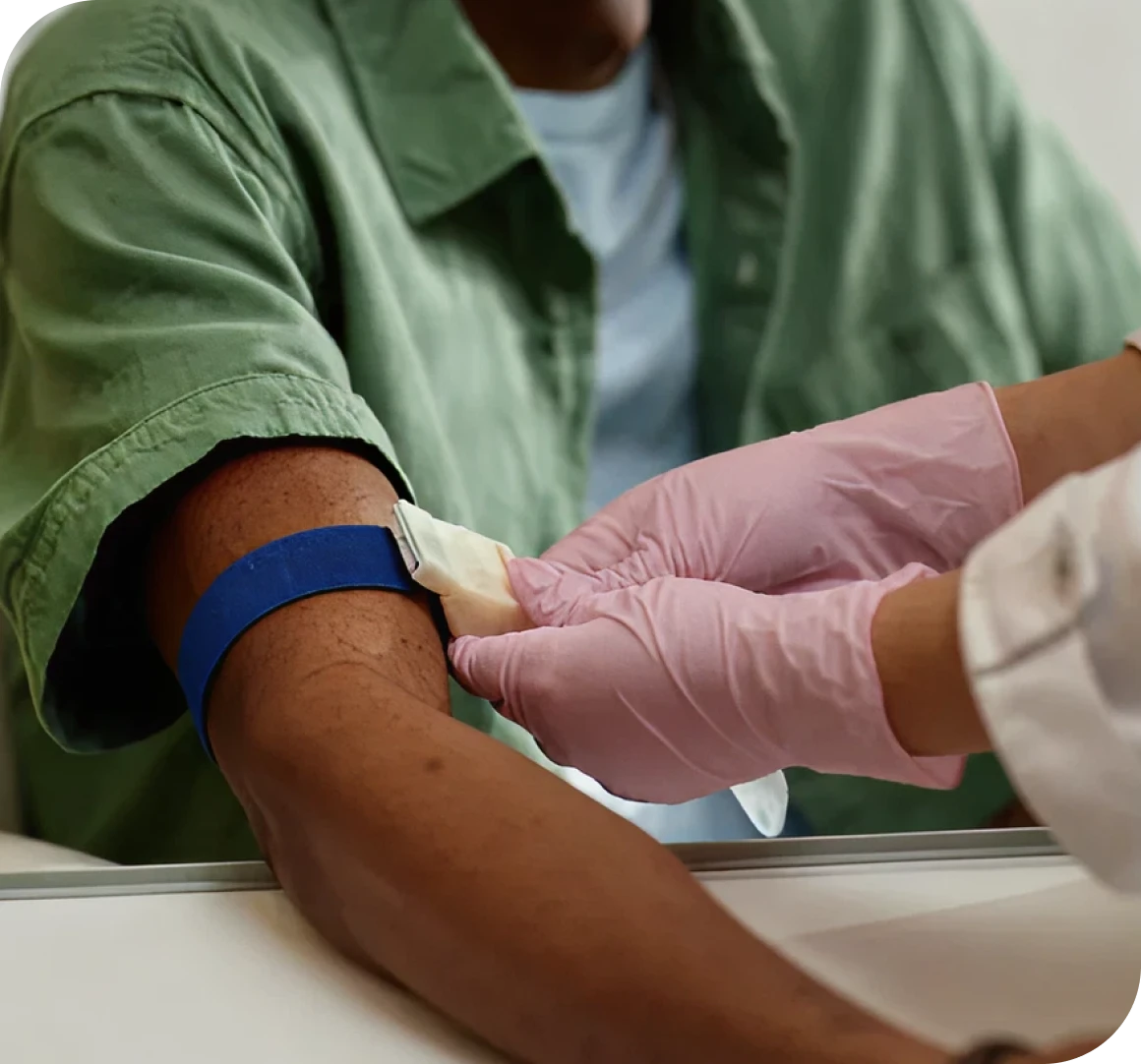 Medical procedure with arm and gloves